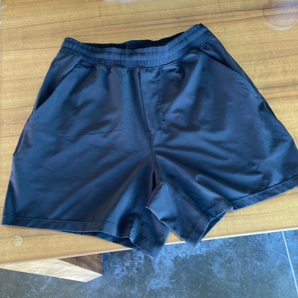 Black lululemon surge shorts. 5 inch Inseam.
